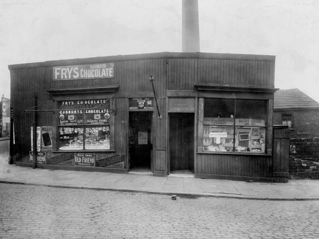 Two retail premises on Botany Bay Place at the junction of Canal Road in April 1923. The premises on the right is Charles Coakley hairdresser and on the left is Moran Valentine Confectioners.