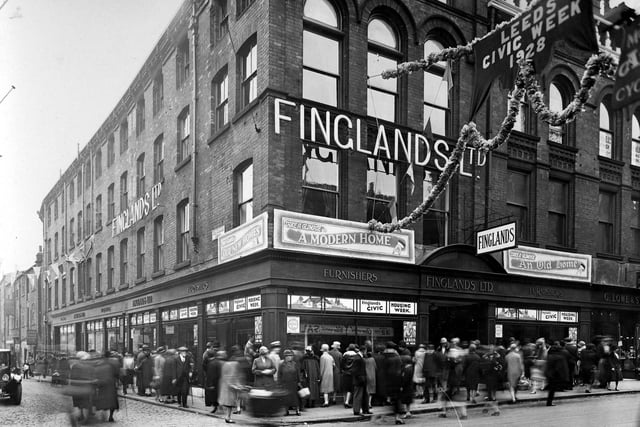 September 1928 and pictured are the prize winning window displays of Finglands Furnishing, located  at the junction of King Charles Street and Guildford Street. As part of Civic Week celebrations shops and street were decorated. The programme of events for the week also included Municipal Tours around the suburbs to show new developments in housing, roads and public works and open days at factories around the city including J.Barran and Sons Ltd., Appleyard and Montague Burton.