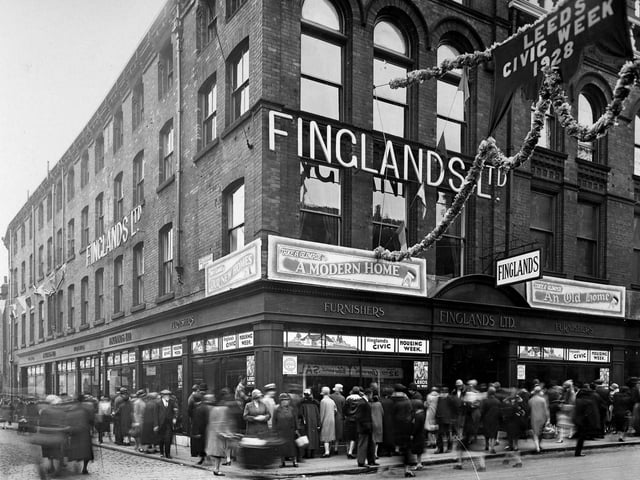 September 1928 and pictured are the prize winning window displays of Finglands Furnishing, located  at the junction of King Charles Street and Guildford Street. As part of Civic Week celebrations shops and street were decorated. The programme of events for the week also included Municipal Tours around the suburbs to show new developments in housing, roads and public works and open days at factories around the city including J.Barran and Sons Ltd., Appleyard and Montague Burton.