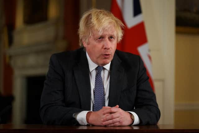 Prime Minister Boris Johnson addresses the public to provide an update on the Covid-19 booster programme, at Downing Street on December 12, 2021