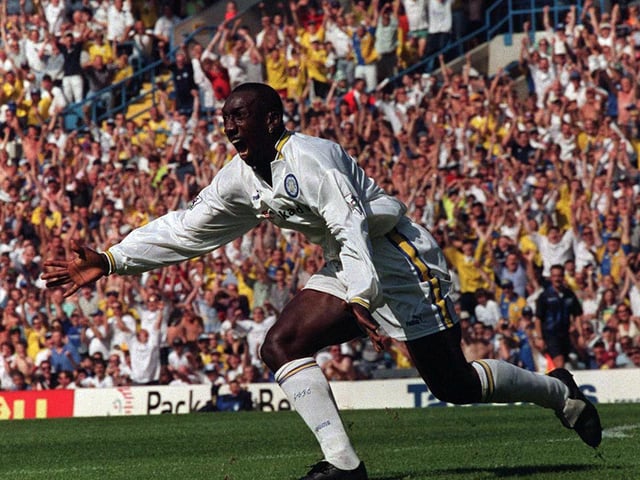 Jimmy Floyd-Hasselbaink celebrates scoring on his Premier League debut against Arsenal at Elland Road in August 1997. PIC: Varley Picture Agency