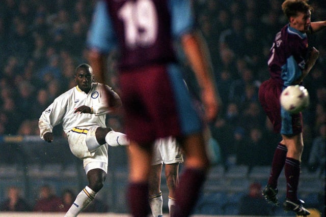 Jimmy Floyd-Hasselbaink fires home during the Premier League clash against West Ham United at Elland Road in November 1997. He bagged a hat-trick in a 3-1 win.