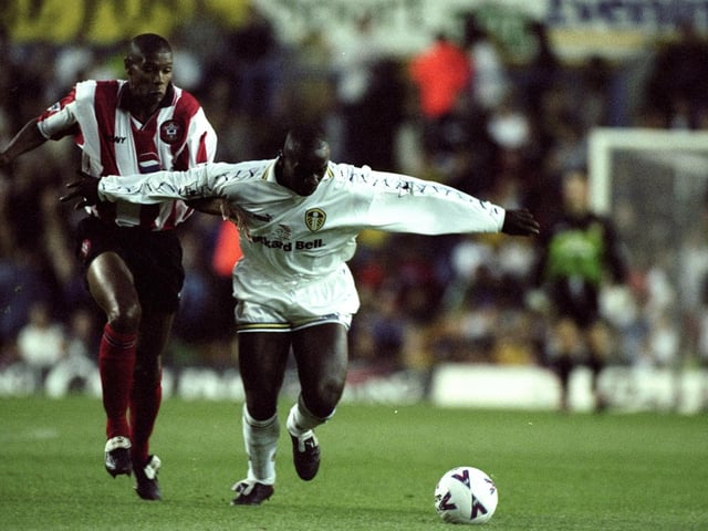 Jimmy Floyd-Hasselbaink holds off Southampton's Carlton Palmer during the Premiership clash at Elland Road in September 1998. Leeds won 3-0.