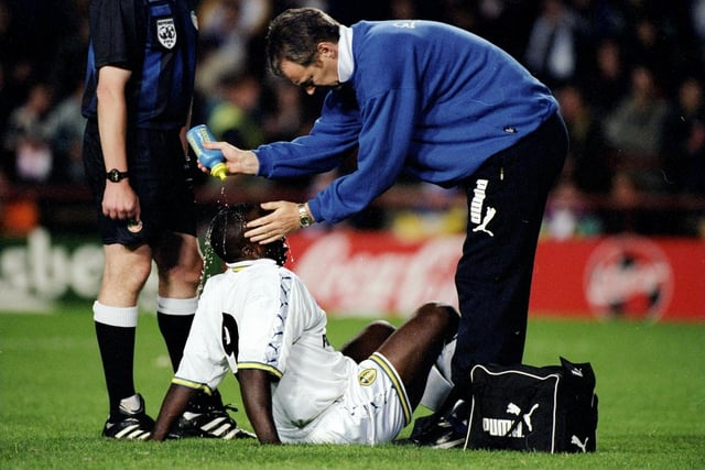 Jimmy Floyd-Hasselbaink receives treatment during a pre-season game against Lazio in Dublin in July 1998.