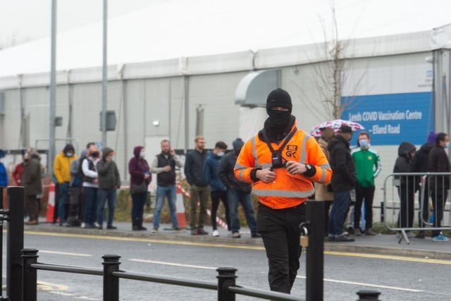 Venue staff were on hand to keep the queuing public informed with many choosing to wear a mask. Picture: James Hardisty.