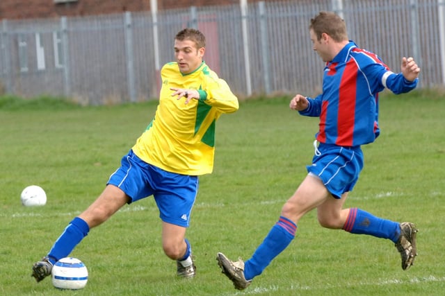 Crown v Wakefield City. Carl Riley of Crown takes on Mark Booth of Wakefield City.