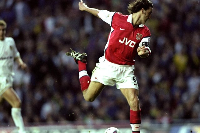 Tony Adams misses a golden chance for the Gunners.