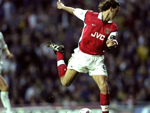Tony Adams misses a golden chance for the Gunners.