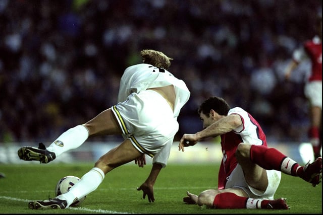Arsenal's Martin Keown concedes a penalty after fouling striker Alan Smith.