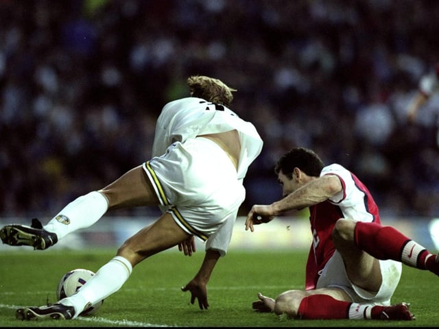 Arsenal's Martin Keown concedes a penalty after fouling striker Alan Smith.