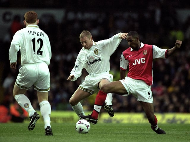 David Batty battles for the ball with Arsenal striker Nicolas Anelka.