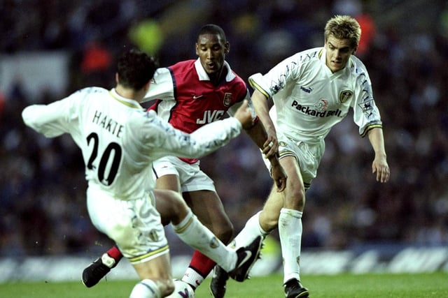 Arsenal striker Nicolas Anelka is stopped in his tracks by Ian Harte and Jonny Woodgate.