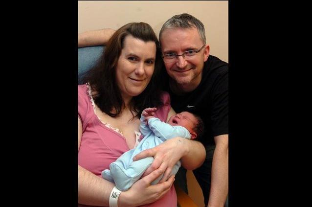 Victoria and Neil Duffy from Chorley with their baby Dexter, born at 9.43am weighing 9lb 9oz at RPH