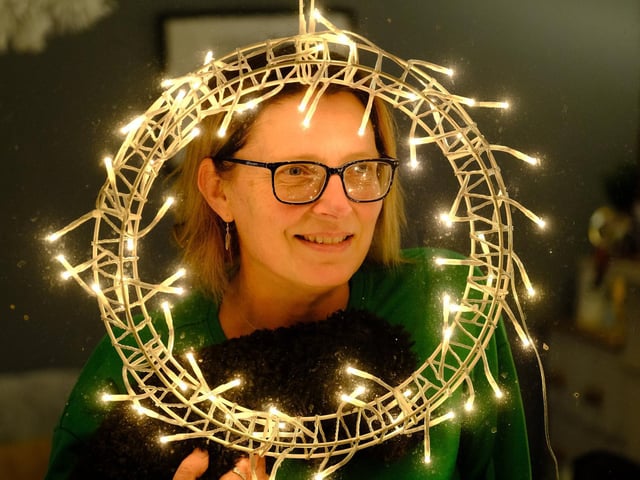 Peering out the window through the lights...