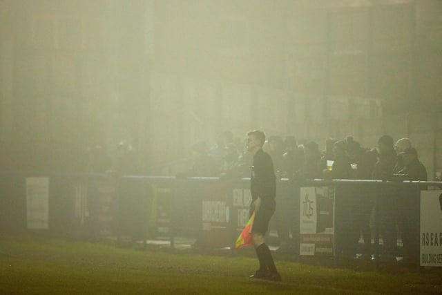 The scene at Ingfield as fog comes down and the linesman looks on.