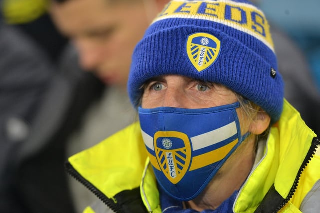 A Leeds United fan donning the colours of his team.