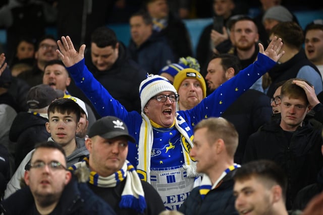 A Leeds United fan sings his support.