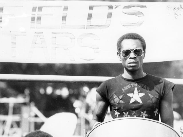 A pan player with Huddersfield's North Stars Steel Band is pictured at the 13th Leeds West Indian Carnival. The photograph was taken in Potternewton Park, the assembly point for the bands, troupes and individuals taking part in the carnival procession on August Bank Holiday Monday, 1980. Picture by C E Shaw.