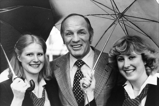 Boxer Henry Cooper visited Howson-Algraphy in Leeds in November 1980. He is pictured with Caroline Somes (left), publicity manager, and Rosemary Jones, public relations officer.