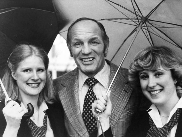 Boxer Henry Cooper visited Howson-Algraphy in November 1980. He is pictured with Caroline Somes, left, publicity manager, and Rosemary Jones, public relations officer.