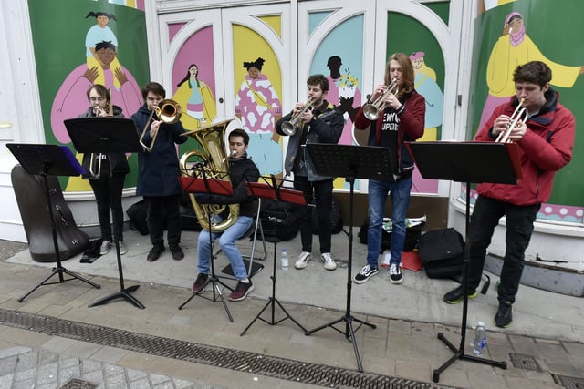 Festive tunes filled the air as the Welcome to Leeds band played to passers by