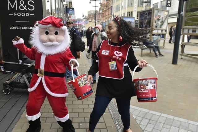 UCKG Help Centre entertain the shoppers in Briggate