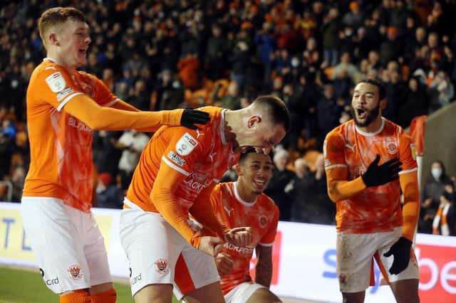 Jerry Yates celebrates scoring Blackpool's third goal of the game