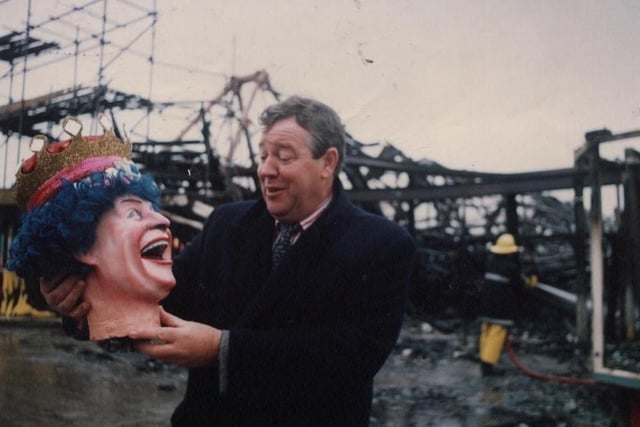 Smiles after the tears. Pleasure Beach boss in 1991, the late Geoffrey Thompson, with the undamaged head of the clown. It only survived because it was being repaired