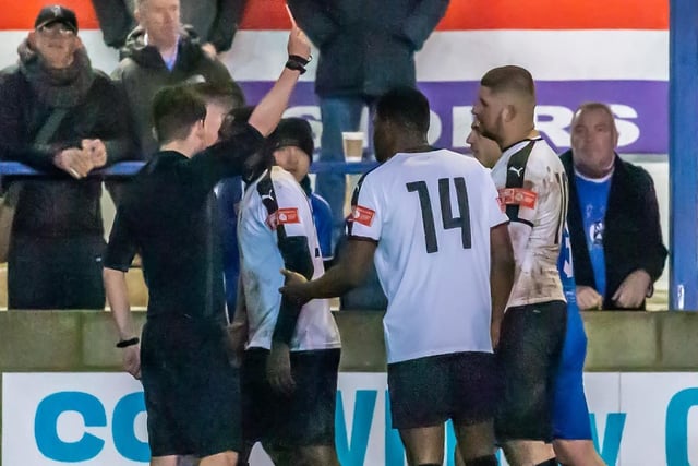 Grantham Town's Glenn Yala is sent off for a challenge on Whitby Town's Malik Dijksteel, who is on loan from Middlesbrough FC.