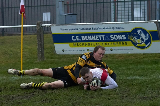 Mike Hayward dives over for a try for Cleckheaton.