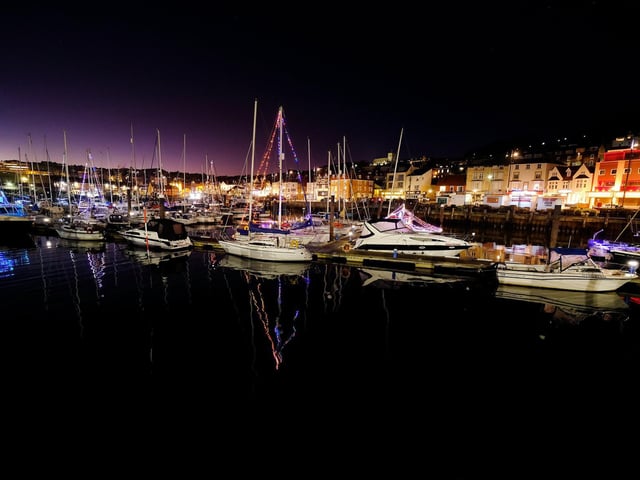 Christmas lights on boats in the harbour.
