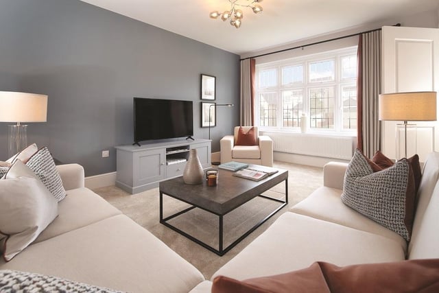 The living room is the perfect modern yet cosy space to relax.