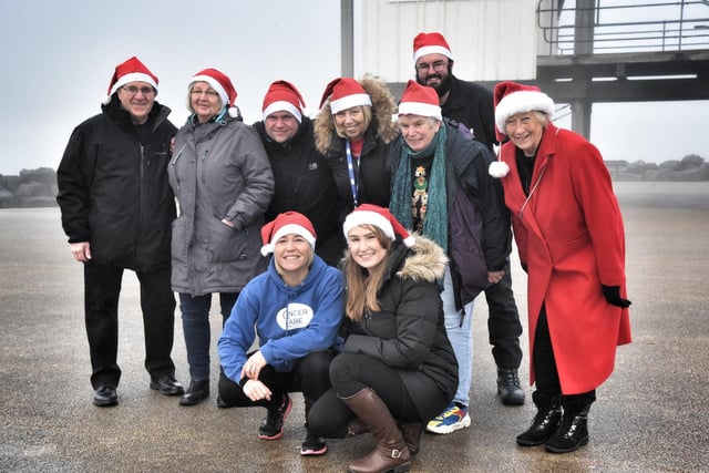 Morecambe Santa Dash Cancer Care staff and volunteers. Picture by Julian Brown /JPIMedia 19/12/21