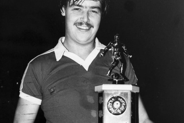 New Kings Arms captain Peter Jackson with the Leeds Monsanto League's Bronte Trophy in April 1981 after his team beat Donic Cards 1-0 in extra time at Fearnville.