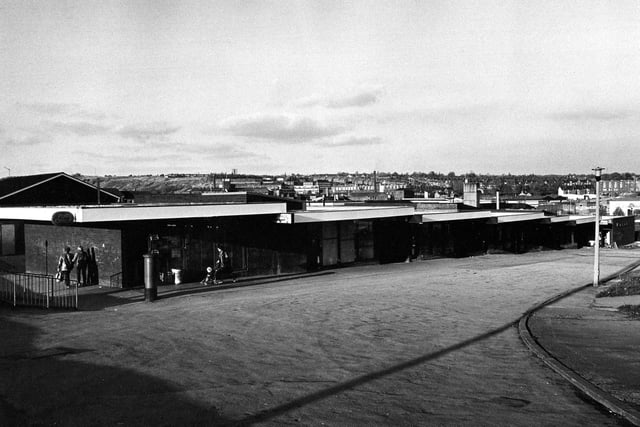 A shopping parade at the junction of Oatland Lane and Lovell Park Road in November 1981. The shops include a Post Office on the left with a pillar box outside and a newsagents on the right. In the background is Little London and Chapeltown.