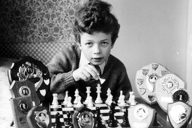 This is Manston Middle School pupil Christopher Bennett who was celebrating after becoming  Leeds School's U-12 chess champion in November 1981.