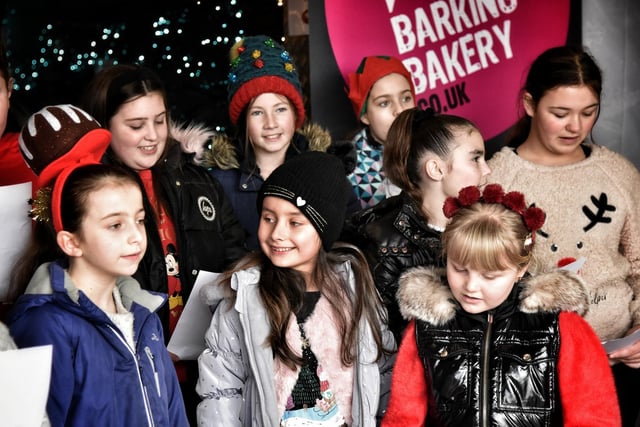 Christ The King Catholic Academy and St. Cuthbert's Catholic Academy joint choir sing Christmas carols at The Barking Bakery, Blackpool.