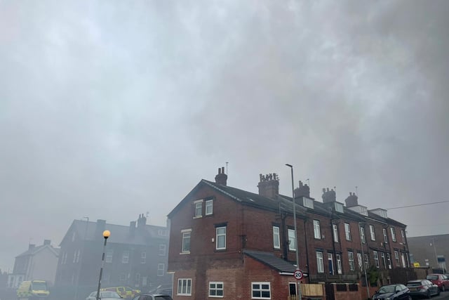 The streets surrounding the fire are now clouded in smoke