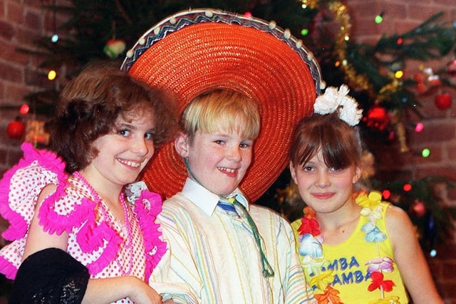 Megan Haines, Mark Chadwick and Emma Brindle prepare for their nativity called Christmas Around the  World at Treales School, 1996