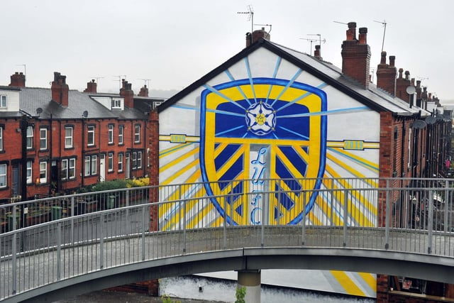 Shane Green, from Otley, created this mural of the Leeds United badge across two end of terraces on Tilbury Mount in Holbeck, near the footbridge for the M621.