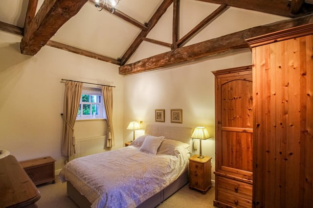 Style and period charm is as evident in the bedrooms as in other parts of the barn conversion.