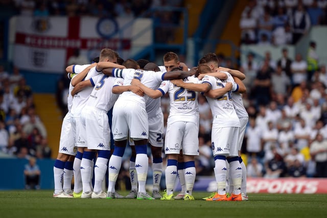 Leeds United players in a huddle ahead of the game.