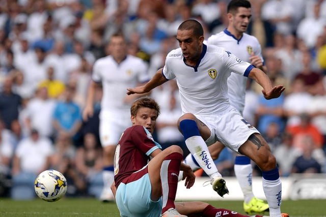 Giuseppe Bellusci is challenged by Burnley's Jelle Vossen.