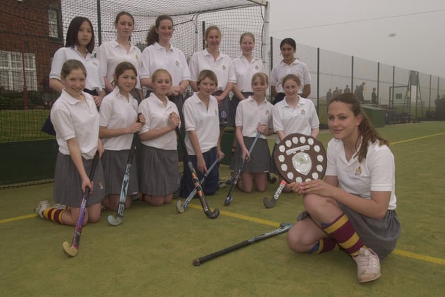 Do you recognise anyone from this schools hockey team photo?