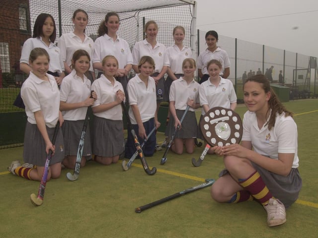 Do you recognise anyone from this schools hockey team photo?