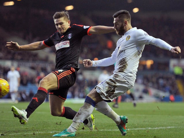 Mirco Antenucci  has his cross blocked by Fulham's Shaun Hutchinson during the Championship clash at Elland Road in December 2014.