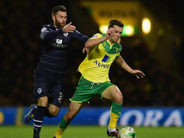 Mirco Antenucci battles with Norwich City midfielder Jonny Howson during the Championship clash at Carrow Road in October 2014.