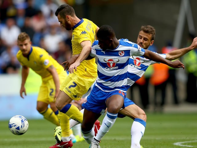 Mirco Antenucci battles for the ball with Reading's Aaron Tshibola (centre) and Orlando Sa (right) during the Championship clash at the Madejski stadium in August 2015.