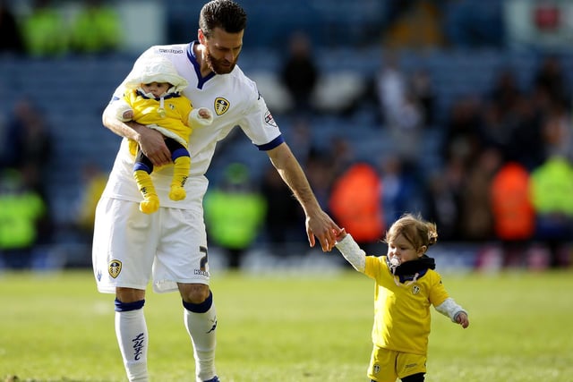Mirco Antenucci holds his daughters hand and thanks the faithful after the Championship clash against Charlton Athletic at Elland Road in April 2016.