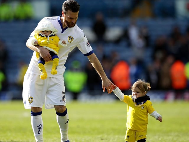 Mirco Antenucci holds his daughters hand and thanks the faithful after the Championship clash against Charlton Athletic at Elland Road in April 2016.